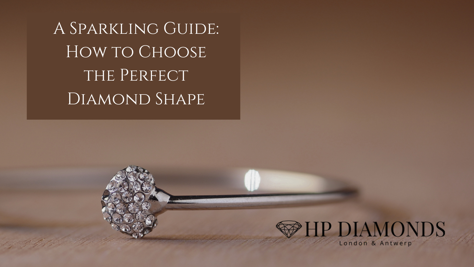 Diamonds are not only symbols of love and commitment but also exquisite expressions of individuality and style. One of the most crucial decisions when purchasing a diamond is selecting the right shape. From classic round brilliants to fancy shapes like princess cuts and emeralds, each diamond shape possesses its own unique charm and characteristics. Here’s a comprehensive guide to help you navigate through the dazzling array of diamond shapes and choose the perfect one for you. 1. Understand Your Preferences: Before diving into the technical details, take some time to explore your personal preferences. Consider your style, personality, and the overall aesthetic you desire. Are you drawn to timeless elegance, modern sophistication, or vintage allure? Understanding your preferences will guide you towards the diamond shape that best reflects your individuality. 2. Explore Diamond Shapes: Familiarize yourself with the various diamond shapes available in the market. Some of the most popular options include: - Round Brilliant: Classic and timeless, known for exceptional brilliance and fire. - Princess Cut: Square or rectangular shape with sharp corners, offering contemporary elegance. - Emerald Cut: Rectangular shape with step-cut facets, prized for its sleek and sophisticated appearance. - Oval Cut: Elongated shape with brilliant faceting, creating a flattering and elongating effect on the finger. - Marquise Cut: Boat-shaped with pointed ends, renowned for its unique and eye-catching silhouette. - Pear Cut: Combination of round and marquise shapes, featuring a teardrop outline that exudes elegance and grace. - Cushion Cut: Square or rectangular shape with rounded corners, offering vintage-inspired charm and romantic appeal. - Asscher Cut: Square shape with step-cut facets, reminiscent of Art Deco glamour and architectural sophistication. - Old Cut: Old cut diamonds have a very individual appearance, with fewer facets they tend to sparkle less, yet have a unique appeal. 3. Consider Finger Shape and Size: Different diamond shapes complement various finger shapes and sizes. For example, elongated shapes like ovals and marquises tend to flatter shorter fingers by creating the illusion of length. Conversely, round and princess cuts are versatile options that suit most finger shapes and sizes. Consider trying on different shapes to see how they look on your hand and choose the one that feels most flattering and comfortable. 4. Evaluate Sparkle and Brilliance: Each diamond shape interacts with light differently, resulting in varying levels of sparkle and brilliance. Round brilliants are renowned for their unparalleled sparkle and fire, making them an excellent choice for those seeking maximum brilliance. Fancy shapes like princess cuts and emeralds may exhibit a different play of light, with broader flashes of brilliance or a more subdued glow. Consider your preference for sparkle and choose a diamond shape that aligns with your desired level of brilliance. 5. Reflect on Lifestyle and Practicality: Your lifestyle and daily activities should also influence your choice of diamond shape. If you lead an active lifestyle or work with your hands frequently, you may prefer a low-profile shape like a princess cut or a bezel-set round brilliant that offers greater durability and security. On the other hand, if you prioritize aesthetics and are willing to take extra precautions to protect your diamond, you might opt for a more delicate shape like a pear or marquise cut. 6. Set a Budget: Finally, consider your budget when selecting a diamond shape. While round brilliants are the most popular and widely available shape, they also tend to command a premium due to their exceptional brilliance and popularity. Fancy shapes like princess cuts and ovals may offer a more affordable alternative without compromising on beauty or quality. Set a realistic budget and explore diamond shapes within your price range to find the perfect balance between quality and value. Choosing the perfect diamond shape is a deeply personal and exciting journey that reflects your unique style, preferences, and personality. By considering factors such as your aesthetic preferences, finger shape and size, sparkle and brilliance, lifestyle, and budget, you can confidently select a diamond shape that captures the essence of your love and individuality. Whether you opt for a classic round brilliant or a distinctive fancy shape, your chosen diamond will serve as a timeless symbol of your enduring commitment and affection.